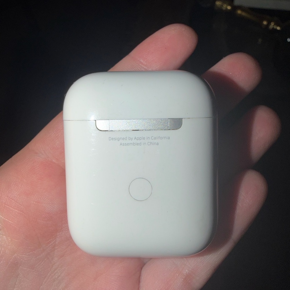 Apple AirPods and charging cord